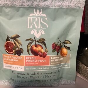 iris electrolyte drink mixes in mint green, orange, and peach packaging